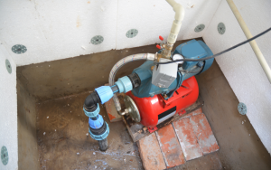 Well pump and pressure tank installed