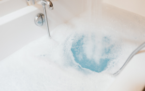 Bath tub water backing